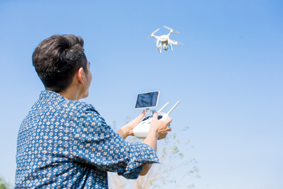 Drone Pilot flying a drone